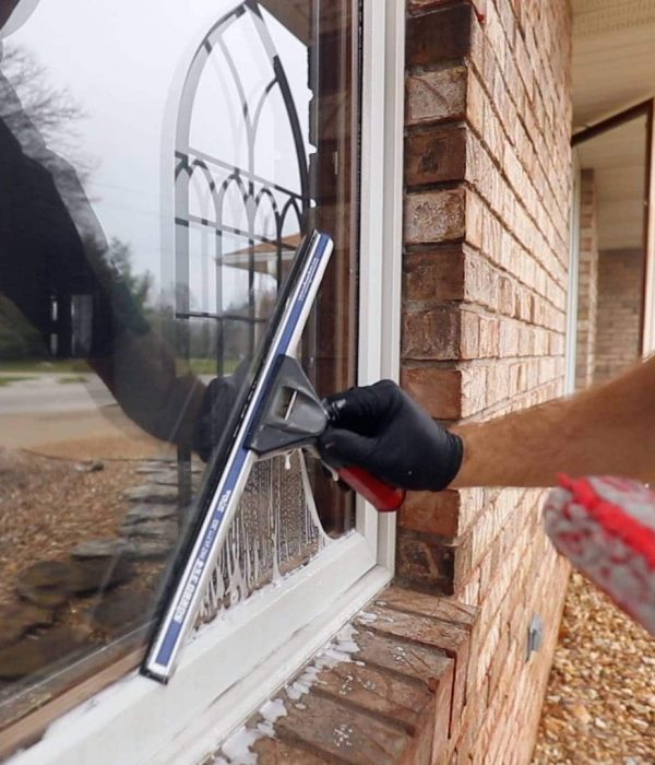 A closeup of high-quality, streak-free window cleaning